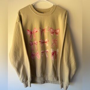 Gildan Women's Tan Sweater with Pink Bow Accents